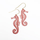 Seahorse earrings in Coral