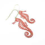Seahorse earrings in Coral