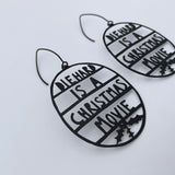 Die Hard is a Christmas Movie earrings in Black