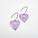 Mini Groove is in the Heart earrings in Purple