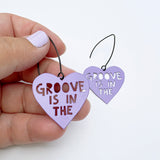 Mini Groove is in the Heart earrings in Purple