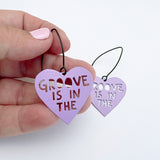 Mini Groove is in the Heart earrings in Purple