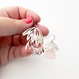 Mini Protea flower dangle earrings in Silver/Rose Gold